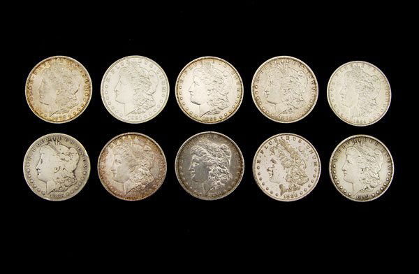 COLLECTION OF 10 MORGAN SILVER DOLLARS: COLLECTION OF 10 MORGAN SILVER DOLLARS: Ungraded. Includes 1878, 1880 (note condition), 1880-S, 1884, 1885-S, 1888-O, 2 1890-S, 1899-O, 1921 (note finish). Approx. 8.5 troy oz.