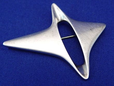 GEORG JENSEN STERLING ABSTRACT # 339 BROOCH: GEORG JENSEN STERLING ABSTRACT BROOCH: Designed by Henning Koppel, approximately 2 1/4" x 2", marked with post 1945 mark GEORG JENSEN, 925S, DENMARK, 339, some light surface wear.