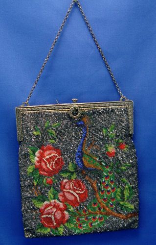VINTAGE PEACOCK AND ROSES MOTIF BEADED PURSE: VINTAGE PEACOCK AND ROSES MOTIF BEADED PURSE: Bright vivid colors, metal frame and clasp. 8 1/2" x 7 1/4".