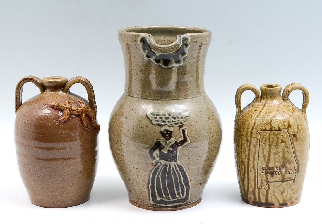 3 PC. SOUTH CAROLINA FOLK ART POTTERY JUGS: 3 PC. SOUTH CAROLINA FOLK ART POTTERY JUGS: Comprising; 2- Mike Williamson jugs, & 1- Edgefield, South Carolina pottery figural pitcher, by Stephen Ferrell. All with incised & impressed signatures. La