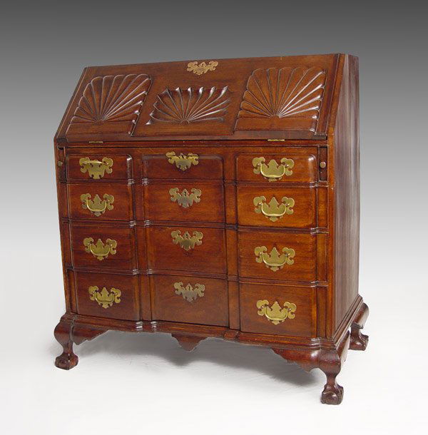 PERIOD AMERICAN BLOCKFRONT DESK CA. 1770'S: 18th CENTURY BLOCK FRONT DESK CA. 1770'S: Drop front desk with fitted interior shell carved lockable compartments, 8 pigeon holes and six drawers. Four graduated drawer front, over all deep carved blo