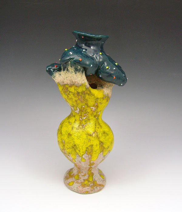 KATHY BUTTERLY SIGNED POTTERY FIGURE: KATHY BUTTERLY SIGNED POTTERY FIGURE: "Making Light of the Ache", signed and titled, dated 1990, 10 3/8" h.