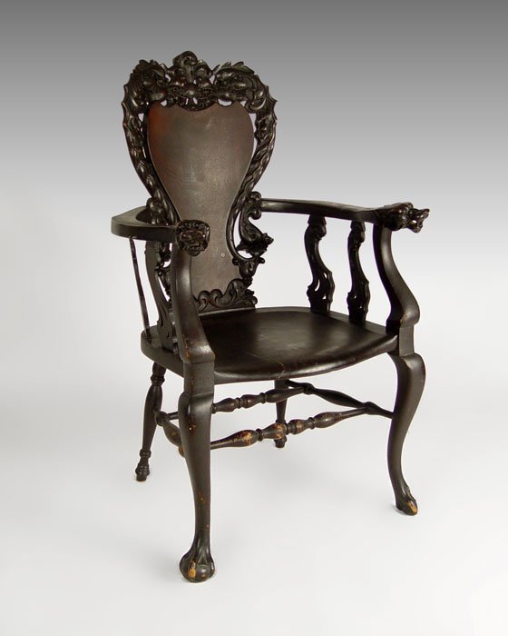 STICKLEY BRANDT CARVED DRAGON HEAD CHAIR: VICTORIAN ORNATELY CARVED DRAGON CHAIR attrib. STICKLEY BRANDT: Victorian carved arm chair. Double dragon carved back. Arms with carved dragon heads, molded seat and cabriole legs with stretcher and c