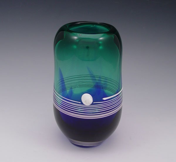 DUNCAN McCLELLAN STUDIO ART GLASS VASE: McCLELLAN, Duncan (American 20th C), STUDIO ART GLASS VASE: Cobalt fades to aqua, with white threading, 7 1/2'' tall. One of Duncan McClellan's earliest pieces.