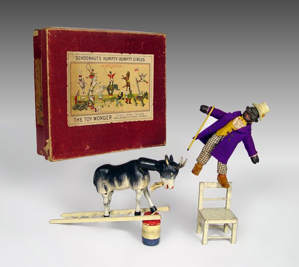 SCHOENHUT HUMPTY DUMPTY CIRCUS 20 / 8 WITH BOX: SCHOENHUT HUMPTY DUMPTY CIRCUS 20 / 8 IN ORIGINAL BOX: Set includes 1) ''Black Dude'' with original costume, 9'' h. 2) Goat, 5'' h. x 8 1/2''. 3) Ladder, 11 3/4'' h. 4) Chair, 5''. 5) Barrel 2 3/4''. 