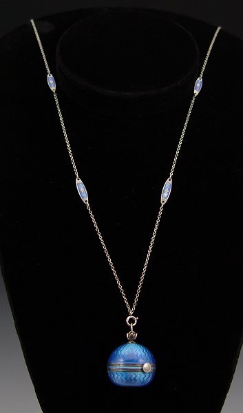 GUILLOCHE ENAMEL BALL WATCH / STERLING CHAIN : GUILLOCHE ENAMEL BALL WATCH: Pendant watch with matching sterling chain. The chain is interspersed with enamel plaques. Porcelain dial, Swiss movement. Running order. Please note very small smudge of 