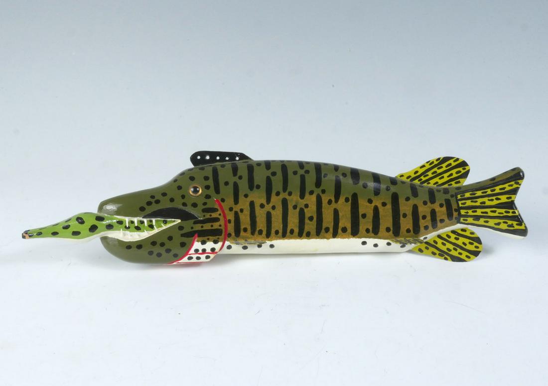 LARGE MUSKIE EATING A FROG FISH DECOY BY JIM NELSO (1 of 3)