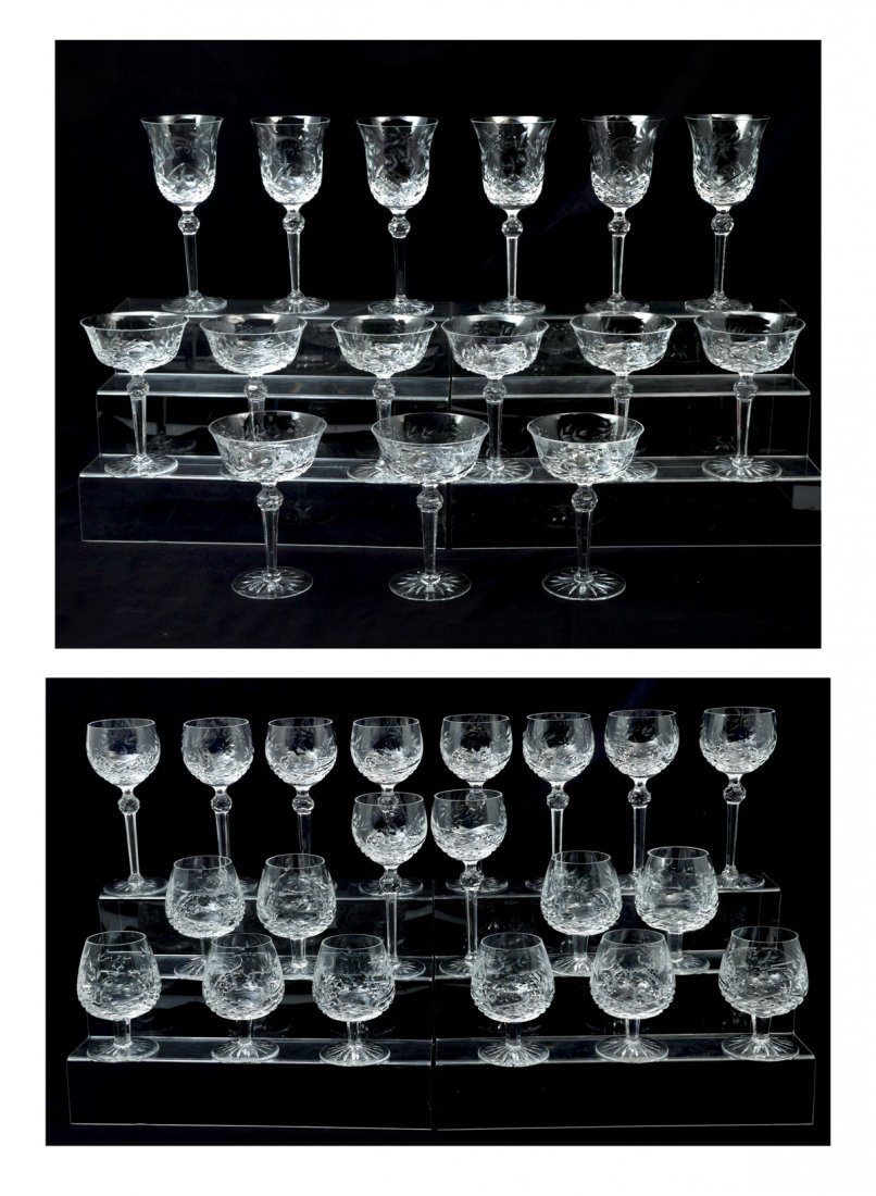 WEDGWOOD SOVEREIGN STEMS: WEDGWOOD SOVEREIGN STEMS: 1) 10 8" H wine hocks; 2) 10 5.25" brandy glasses; 3) 6 6.75" water goblets; 4) 9 6.5" champagne/tall sherbet glasses. All pieces have Wedgwood logo on base.