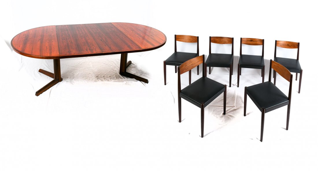 FREM ROJLE DANISH DINING TABLE AND 6 CHAIRS: FREM ROJLE DANISH DINING MID-CENTURY ROSEWOOD TABLE AND 6 CHAIRS: With 2 leaves, table measures 48" diameter, each leaf is 19" wide, table and chairs are both stamped.