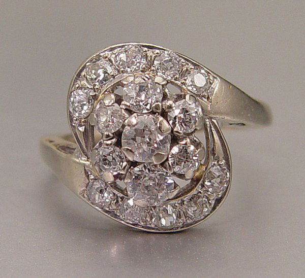 14K OLD EURO & MINE CUT DIAMOND RING 2.25 ct 4.66: 14K DIAMOND FASHION RING: 14 K white gold ring contains 17 old mine and old European cut diamonds, approx. 2 .25 Ct., averaging H-I color, SI - I clarity. Sixe 7.75 Weight: 4.66 grams.