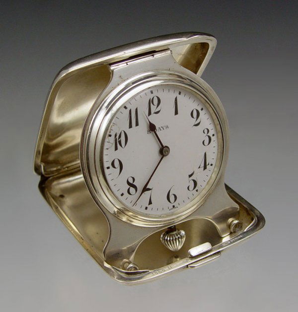 8 DAY MAJESTIC STERLING TRAVEL CLOCK: 8 DAY MAJESTIC STERLING TRAVEL CLOCK: Beautiful sterling silver travel clock by the Majestic Company of Switzerland. 8 day wind runs good and keeps accurate time. Original crown and stem. Engraved cas