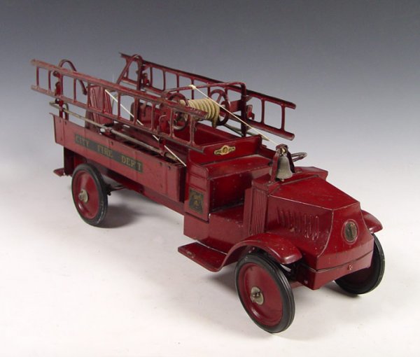 STEELCRAFT FOR JC PENNY MACK FIRE TRUCK 1920'S: STEELCRAFT PRESSED STEEL MACK FIRE TRUCK: Circa 1920's Steelcraft "Little Jim" for J.C. Penney Mack J. City Fire Department truck in original condition with original labels. Complete with side ladders