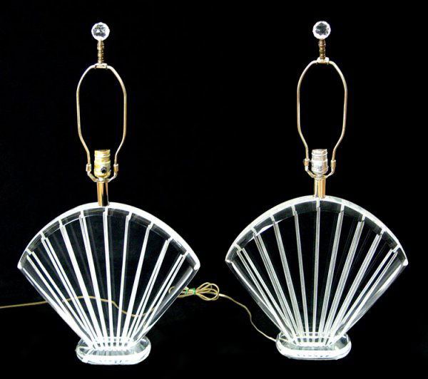 PAIR VAN TEAL LUCITE ACRYLIC TABLE LAMPS: PAIR VAN TEAL LUCITE TABLE LAMPS: Flared shell form mid to later 20th C. 30'' tall overall. Accompanied by the later fringe shades.