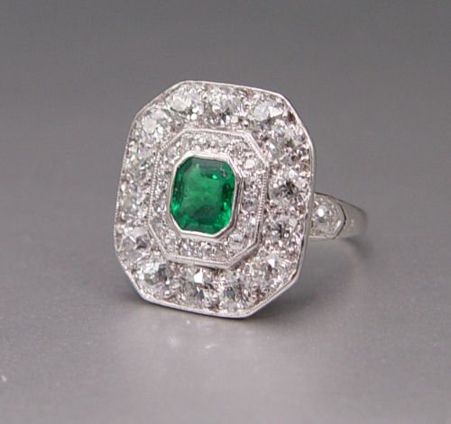 EDWARDIAN PLATINUM EMERALD AND DIAMOND RING: EDWARDIAN PLATINUM EMERALD AND DIAMOND RING: Platinum ring contains thirty four old European round and single cut round diamonds. Weight: 2.50 Ct. Approx. The diamonds average VS in clarity and G-H in