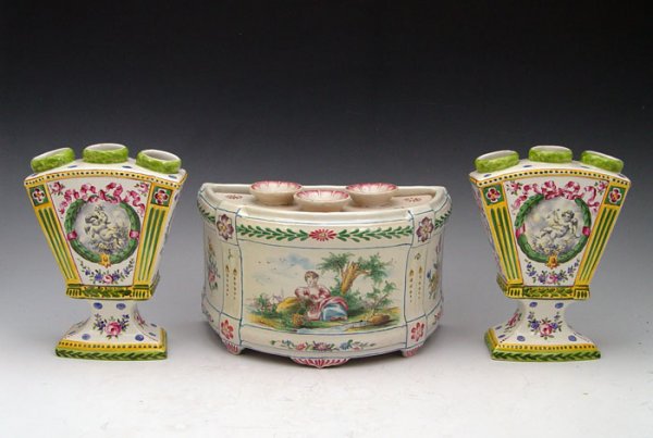 3 PIECE SCEAUX FRENCH FAIENCE TULIPIERES: 3 PIECE SCEAUX FRENCH FAIENCE TULIPIERES: Center demi vase, 5" x 8 3/4", joined by a pair of fan vases, 6 3/4"h.