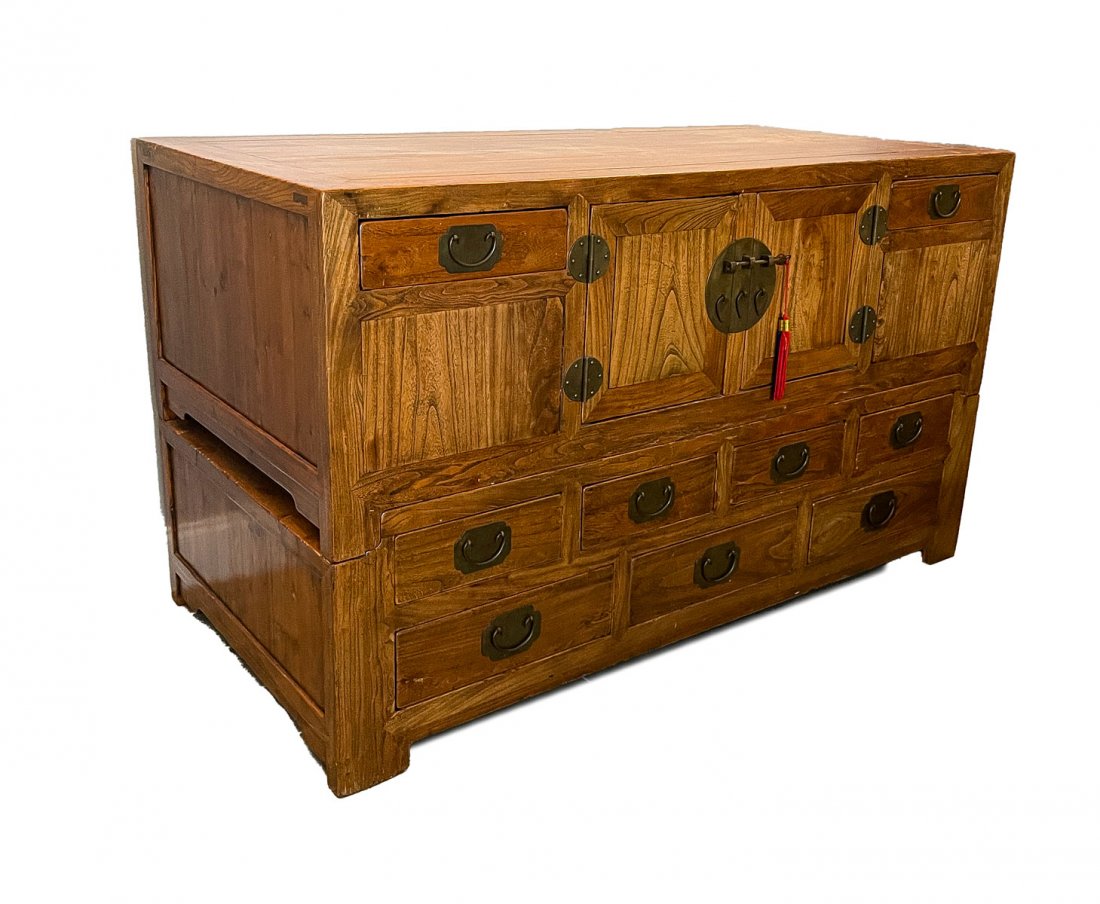 ANTIQUE CHINESE CLOTHING SIDEBOARD: ANTIQUE CHINESE CLOTHING SIDEBOARD: Qing dynasty Chinese chest on chest. Of elm & pine wood, having 9 drawers and 2 doors. Approx. 34.5'' h x 58.5'' l x 28.5'' w.