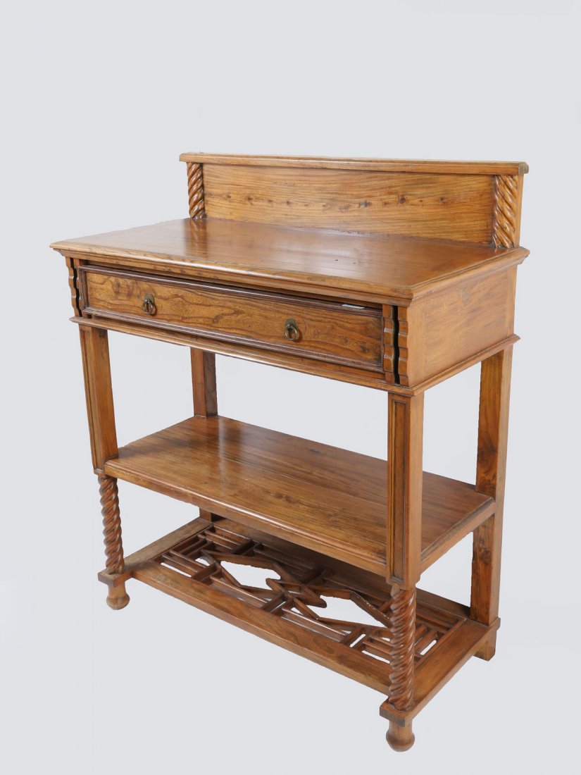 ANTIQUE CHINESE CARVED SIDE TABLE: ANTIQUE CHINESE CARVED SIDE TABLE: Qing dynasty single drawer side table, of Elm. Carved in the Ming style, having spiral supports and a fretwork lower shelf. Approx. 46.25'' h x 39.25'' l x 19'' w.