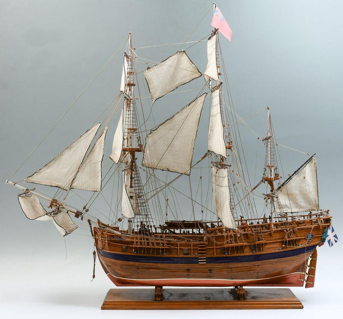 ROYAL NAVY GALLEON SHIP MODEL: ROYAL NAVY GALLEON SHIP MODEL: British Navy Galleon war ship, having cloth sails, cannons, and many other details. Approx. 29" h x 32.25" l x 9.75" w.