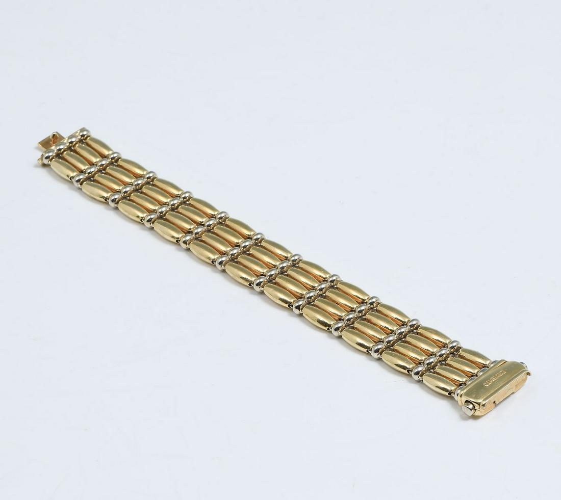 2 TONE 18K CHIMENTO 4 ROW BRACELET: 2 TONE 18K CHIMENTO 4 ROW BRACELET: 18K bracelet by Chimento is done on 4 rows of alternating white beads and gold bars to form this 7.25'' bracelet. Total weight 42.9 grams. Marked 750 Chimento.