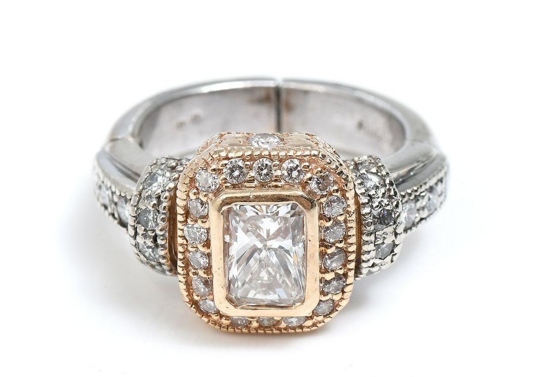2 TONE 14K 1.80 CTW DIAMOND RING: 2 TONE 14K 1.80 CTW DIAMOND RING: This ring features a 1.0 CT modified rectangular cut-cornered brilliant cut diamond, bezel set in rose gold. An additional 34 round brilliant cut diamonds are strateg