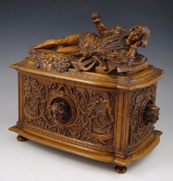 VICTOR AIMONE FIGURAL CARVED BOX 1886: AIMONE, Victor, (Italian, 19th C.): Figural Carved Walnut Box. 12 3/4" x 13 3/4" x 9", secret compartment in bottom, signed twice, dated 1886.