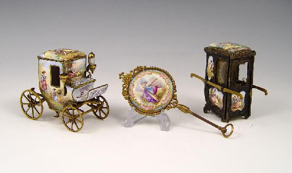 MINIATURE AUSTRIAN ENAMEL CARRIAGE & SEDAN: 3 PIECE MINIATURE AUSTRIAN VIENNESE ENAMEL: 1) Carriage with hinged top, 2 1/4''h. x 3''. 2) Sedan with hinged door, the interior is enameled s well as the exterior, 2 1/2''h. 3) Beveled hand mirror,