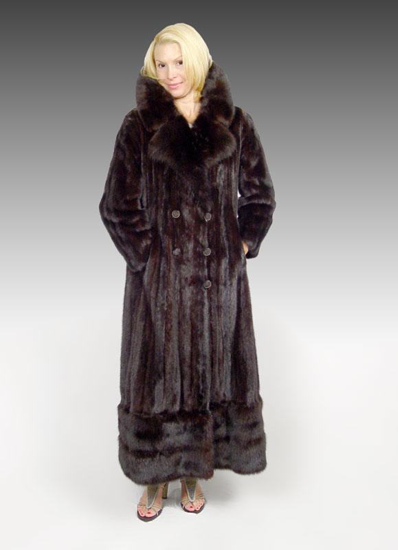 FULL LENGTH MINK COAT WITH REMOVABLE BORDER: FULL LENGTH MINK COAT WITH REMOVABLE BORDER: Natural ranch female mink coat with sable matched collar and zip off border. 44" long, 53" with sweep. Sold with $12,000 insurance appraisal from 2000.