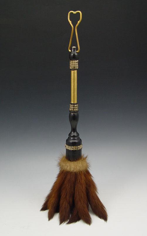 MINK FUR FLY WHISK / TICKLER: MINK TAIL TICKLER / FLY WHISK: Nine mink tails mounted to a wood handle accented with rhinestones and gold cloth, overall approx. 20" including easily removed added hanger.