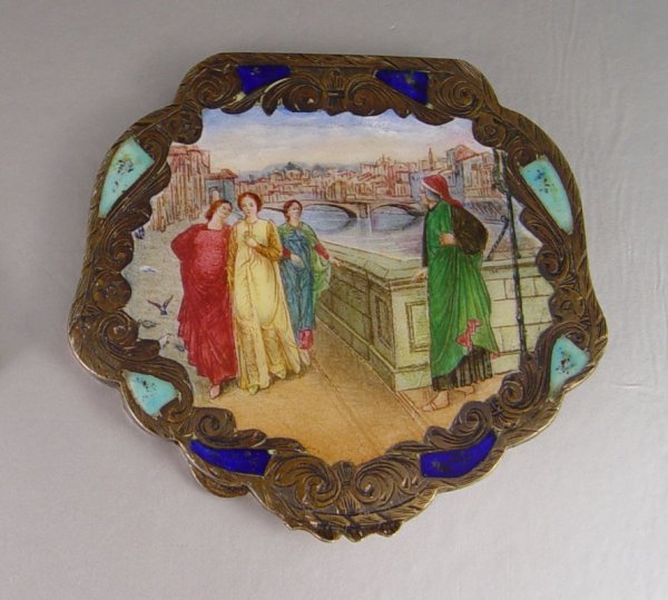 ENAMELED SILVER COMPACT: ENAMELED SILVER COMPACT: Vermeil 800 silver compact. Hinged top with enameled image of a chariot, rider, cupid and maidens. Beveled mirror with small chip on the underside. Stamped 800. 2 3/4" x 3 1/4