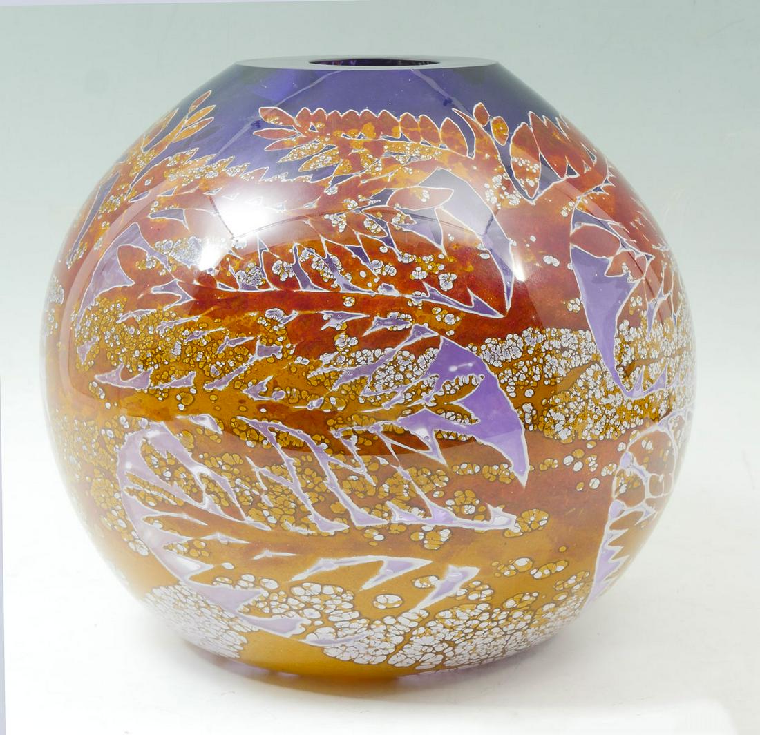 EARLY DUNCAN McCLELLAN ART GLASS VASE: EARLY DUNCAN McCLELLAN ART GLASS VASE: Purple ovoid vase, having a variegated yellow & amber stylized tree motif. Etched signature at underside. Resting on a lighted base. Vase Approx. 10.75" h x 12"