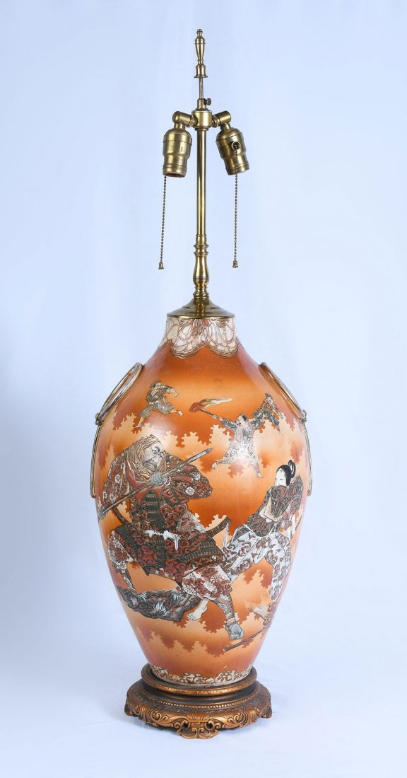 SATSUMA SAMURAI WARRIOR LAMP: SATSUMA SAMURAI WARRIOR LAMP: 2- Light Meiji period Satsuma vase, having Samurai warriors in battle. Warrior's clothing decorated with Moriage enamel. Mounted on a gold toned metal base with a scrolli