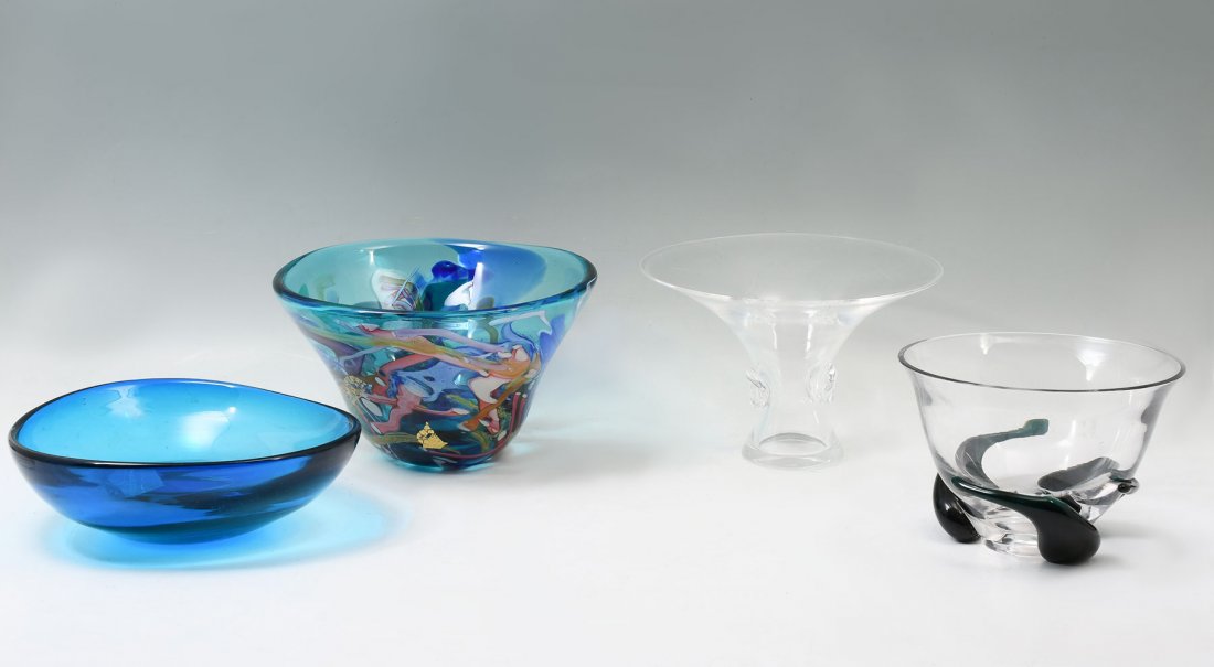 4 PC. ART GLASS VASE COLLECTION: 4 PC. ART GLASS VASE COLLECTION: Comprising; 1- Blue Murano style art glass bowl. 1- Clear art glass bowl with greenish-blue swirling attached glass. 1- Steuben signed flaring vase with attached medal