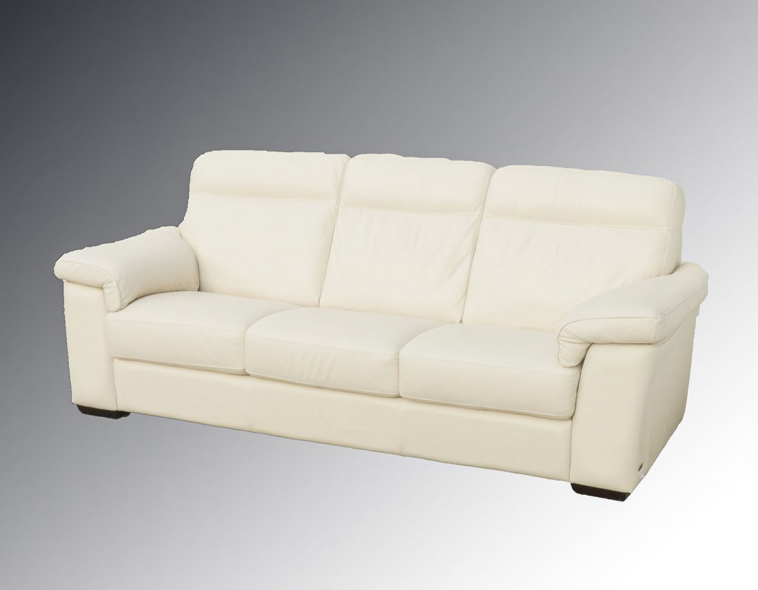 NATUZZI WHITE LEATHER SOFA: NATUZZI WHITE LEATHER SOFA: Italian white leather Natuzzi Editions sofa. Approx. 36.75" h x 91.5" l x 38" w.
