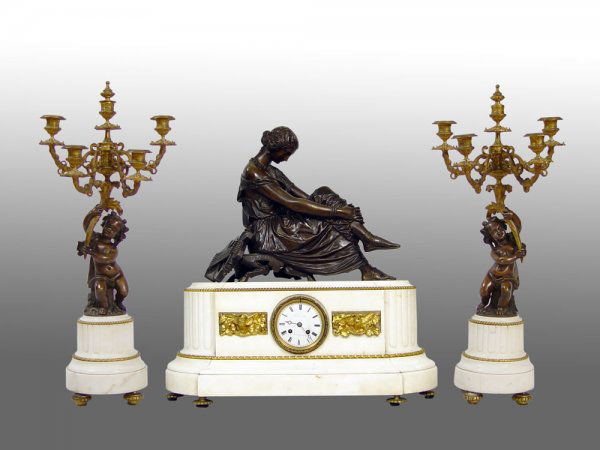 PRADIER BRONZE & MARBLE CLOCK GARNITURE SET: GATIER A PARIS FRENCH BRONZE CLOCK GARNITURE: White marble & ormolu base with figural bronze woman seated. ''The Seated Sappho'' bronze signed J. Pradier, Susse Edit. Enameled face marked Gatier A Par