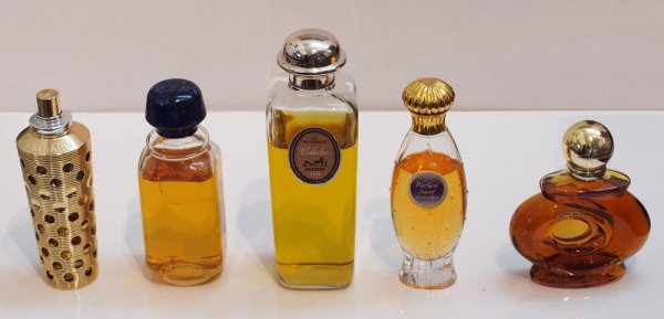 5 PIECE PERFUME HERMES GUERLAIN & MORE: 5 PIECE PERFUME HERMES GUERLAIN & MORE: 5 bottles of perfume partially filled to include Hermes Caleche, Guerlain Shalimar, Caron Sacre. Parfum Galanos, Gevinchey 90. Largest bottle (Hermes) measures