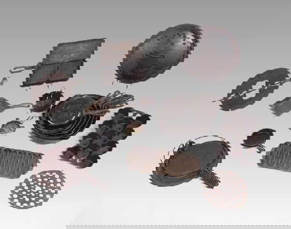 COLLECTION OF GRISWOLD CAST IRON SKILLETS & MORE: COLLECTION OF GRISWOLD CAST IRON SKILLETS & MORE: To include #3-10 skillets (#10 with lid), 0 skillet marked 562, small skillet unmarked number same size as 0, square egg skillet 129, corn, ashtray wi