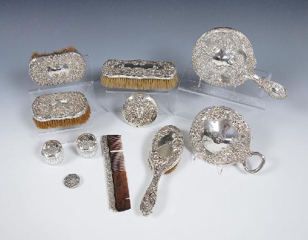 STERLING DRESSER BOXES, MIRRORS, AND BRUSHES: STERLING DRESSER BOXES, MIRRORS, AND BRUSHES: To include 1) 2 Gorham hand brushes 1 3/4" x 3 1/8" x 5 1/8". 2) Gorham bar brush 2" x 7" x 2 1/2". 3) Gorham hand mirror 9 5/8" x 5 1/2". 4) Gorham comb