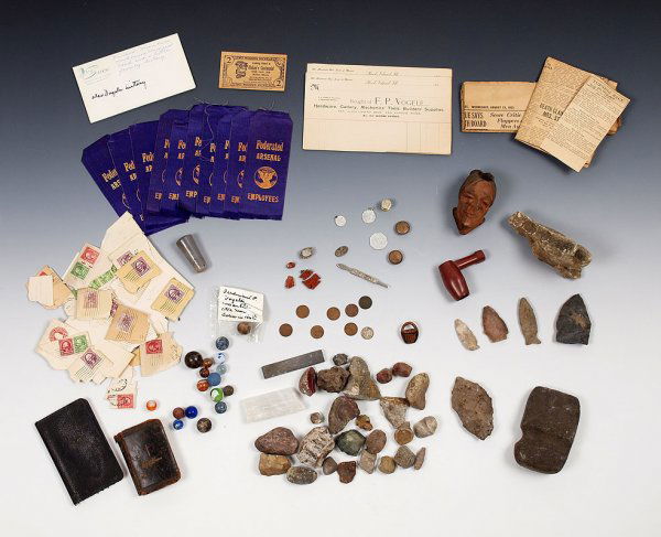 COLLECTION OF INDIAN ARTIFACTS AND EARLY MARBLES: COLLECTION OF INDIAN ARTIFACTS AND EARLY MARBLES: To include Catlinite pipe bowl, carved wood Indian head pipe bowl, axe head, 4 arrowhead points, collection of rocks and minerals, 12 marbles, carved