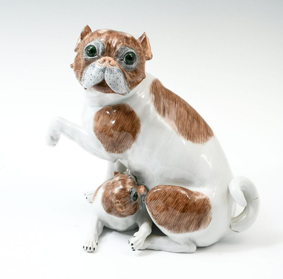CARL THIEME DRESDEN PORCELAIN DOG WITH PUPPY: CARL THIEME DRESDEN PORCELAIN DOG WITH PUPPY: Early Carl Thieme porcelain grouping of a mother dog with her puppy. Blue Dresden mark at right side of tail. Approx. 9.5'' h x 9.5'' l x 6.5'' w.