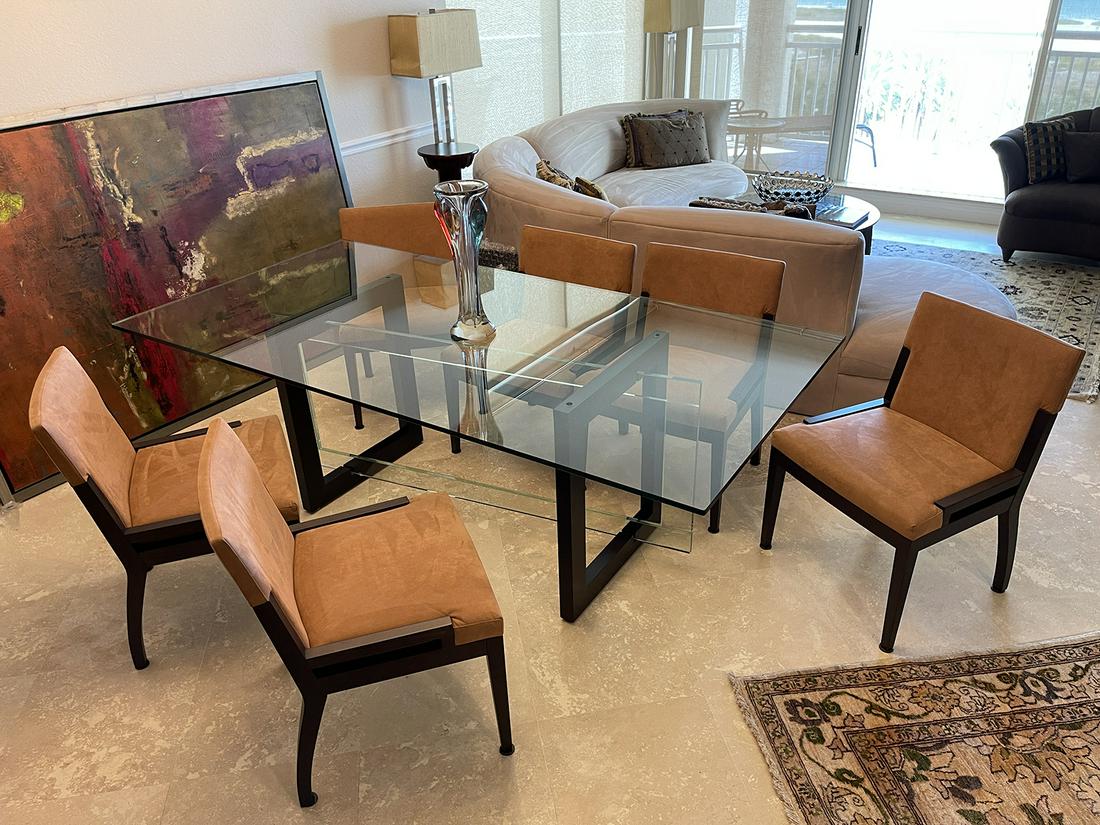 8 PC. FRENCH ROCHE BOBOIS GLASS TOP DINING SUITE: 8 PC. FRENCH ROCHE BOBOIS GLASS TOP DINING SUITE: Comprising; 1- Pyhagoras model glass top dining table. 6- Roche Bobois side chairs. 1- Black Pythagore credenza/sideboard. Table & chairs designed by