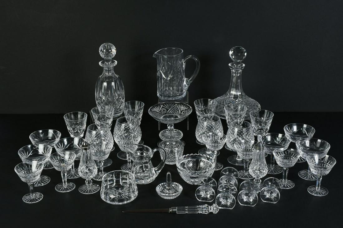 40 PC. WATERFORD CRYSTAL COLLECTION: 40 PC. WATERFORD CRYSTAL COLLECTION: Comprising; 5- Knife rests, 1- Ring holder, 2- Nut dishes, 2- Pitchers, 2 pc. Salt & Pepper, 24 pc. stems of different size & patterns, 2- Decanters, 1- Jam jar, 1
