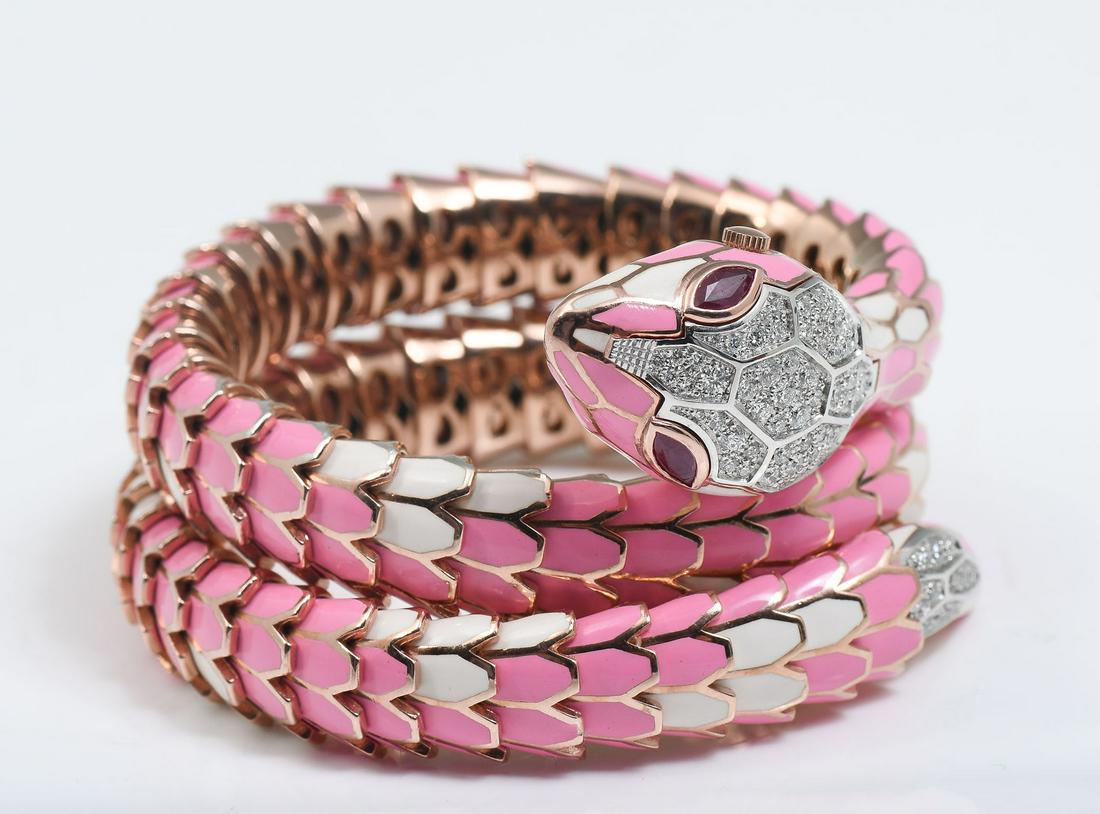 STERLING & 18K PINK ENAMEL SNAKE BRACELET/WATCH: STERLING & 18K PINK ENAMEL SNAKE BRACELET/WATCH: Sterling flexible articulated snake bracelet watch with pink and white enamel 'scales' in the style of Bvlgari. 70 round brilliant cut diamonds. WEIGHT