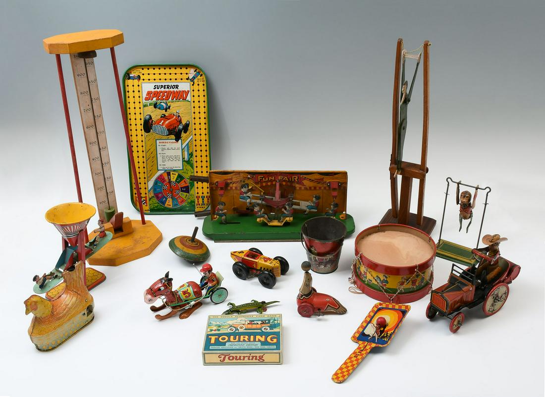 17 PC. ANTIQUE TOY COLLECTION: 17 PC. ANTIQUE TOY COLLECTION: Comprising; A wind-up seal, by J. Chein & Co., Wind-up Horse & Jockey, by Mikuni, Wind-up Whoopee Car, by Louis Marx & Co., Superior Speedway metal game board, Wind-up c