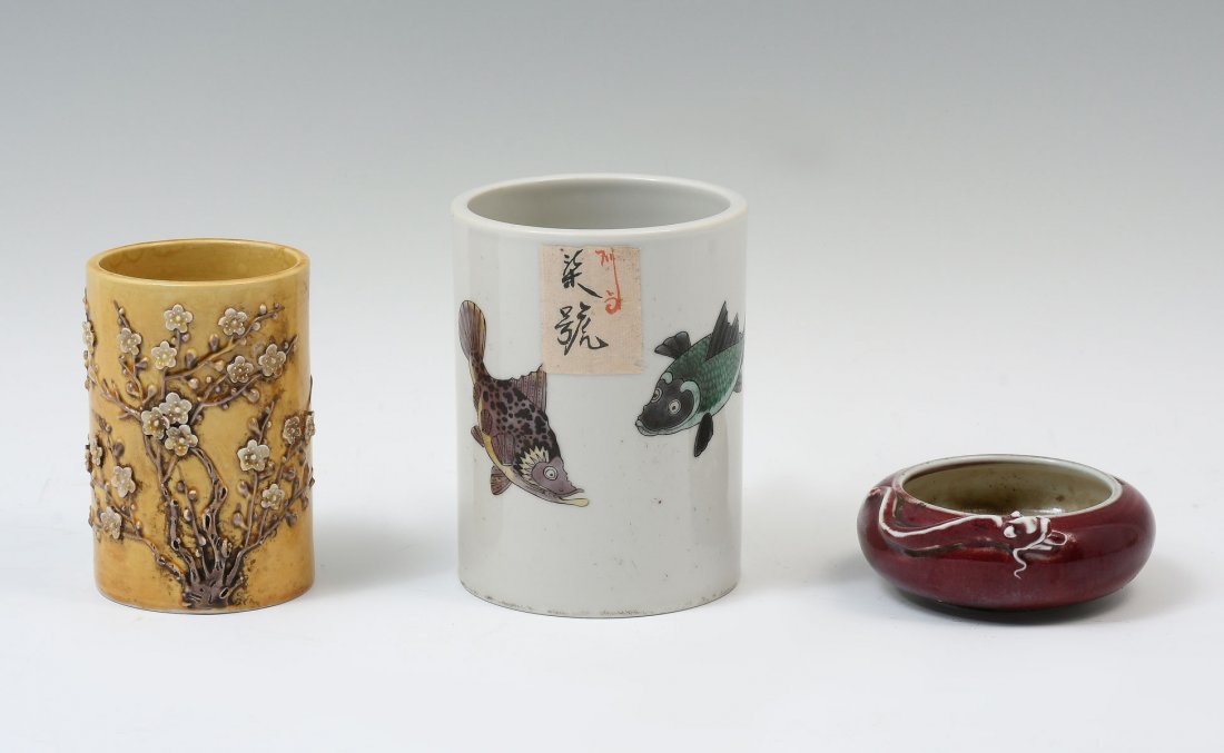 3 PC. CHINESE PORCELAIN BRUSH POTS & BRUSH WASH: 3 PC. CHINESE PORCELAIN BRUSH POTS & BRUSH WASH: Comprising; 1- Republic period brush pot, having enameled fish. Paper tag at side. Red & black marks at underside. 1- Yellow ground brush pot, having a