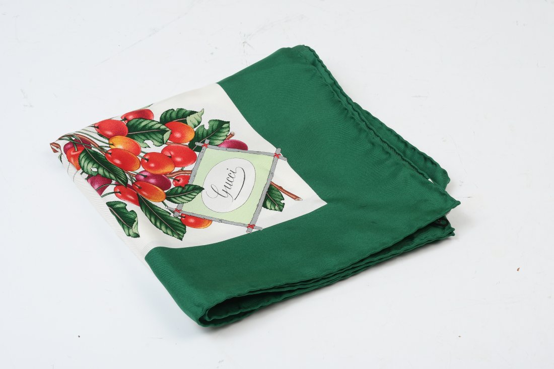 VINTAGE GUCCI SILK MOTHER NATURE SCARF: VINTAGE GUCCI SILK MOTHER NATURE SCARF: 60s/70s Vintage Gucci silk scarf decorated with apples, grapes, cherries, pears, butterflies and other insects with a green border. Signed V. Accornero. GUCCI t