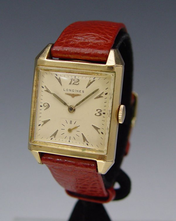 LONGINES ART DECO WRISTWATCH: LONGINES 10K GOLD FILLED WRISTWATCH: 17 jewel Longines caliber 23Z movement. Triple signed. Horned style lugs on a 26mm x 37mm case. Good running order.