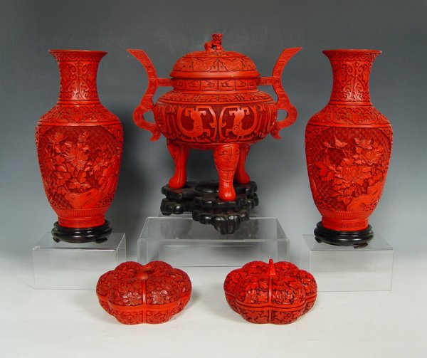CHINESE CINNABAR GROUP: CHINESE CINNABAR GROUP: To include pair of vases with stands, approx. 13 5/8"h. x 6"w.; large tripod censor with stand, approx. 14"h. x 12 3/4" and pair of melon ribbed jars approx. 3 1/2"h. x 6"dia.