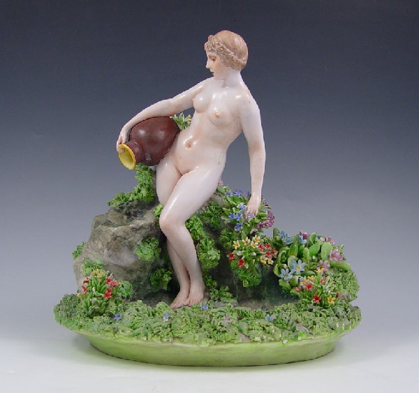 FABRIS ITALIAN PORCELAIN FIGURE: FABRIS ITALIAN PORCELAIN FIGURE: 2 part figure, woman at a well. From the collection of Banana George Blair.