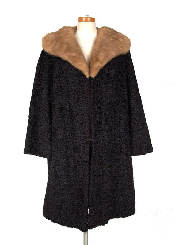 PERSIAN LAMB COAT WITH MINK COLLAR: FULL LENGTH PERSIAN LAMB COAT WITH MINK COLLAR: Bell sleeves and slit pockets. 43"l.