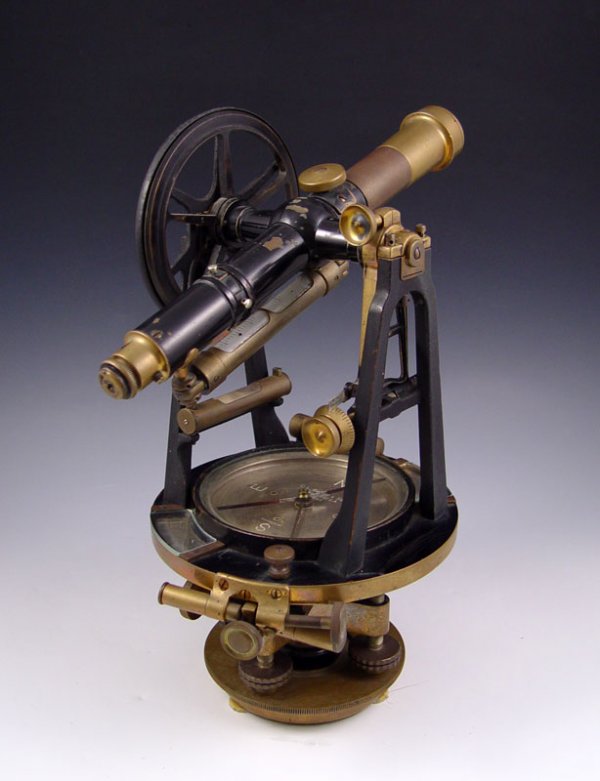 C. L. BERGER & SONS ANTIQUE SURVEYORS TRANSIT: C. L. BERGER & SONS ANTIQUE SURVEYORS TRANSIT: Brass and japanned black finish. Marked on compass C. L. Berger Boston & Sons, USA 6285. Optics appear to work fine. 13 1/4'' h. x 7 1/4'' dia.